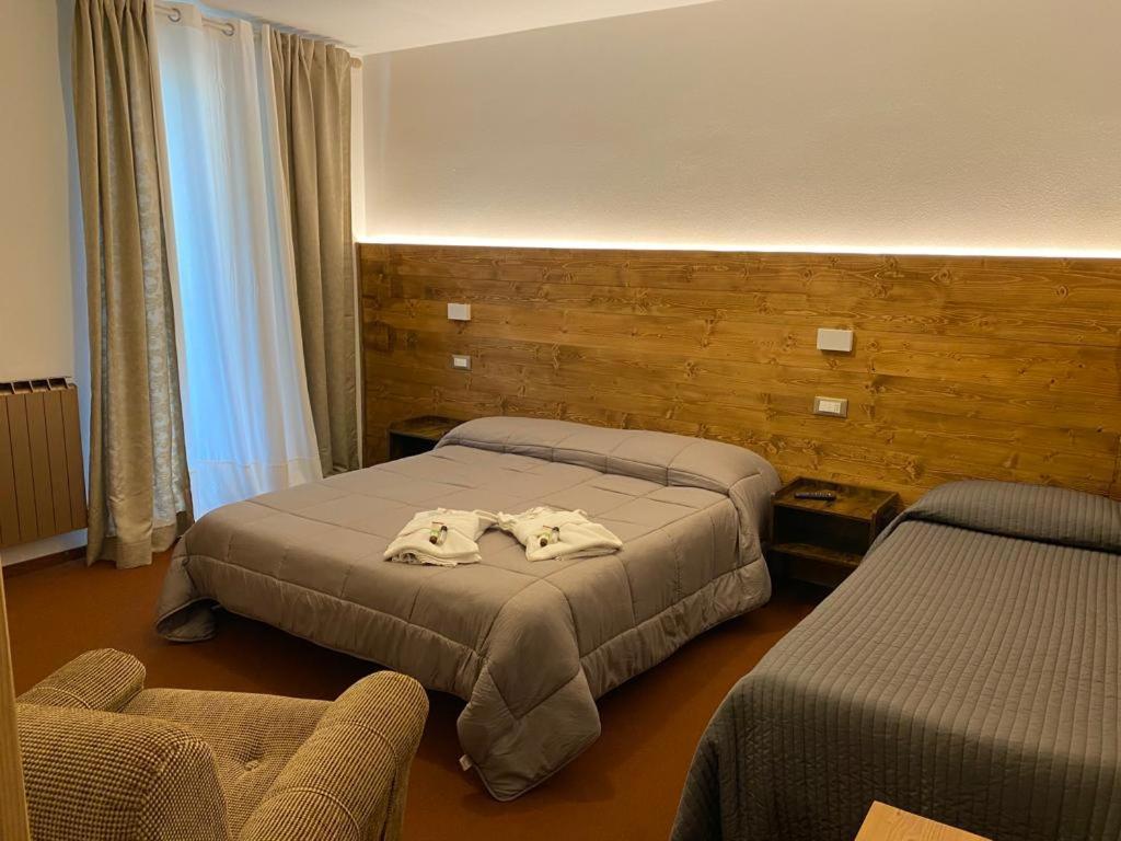 Albergo Quai Monno Buitenkant foto