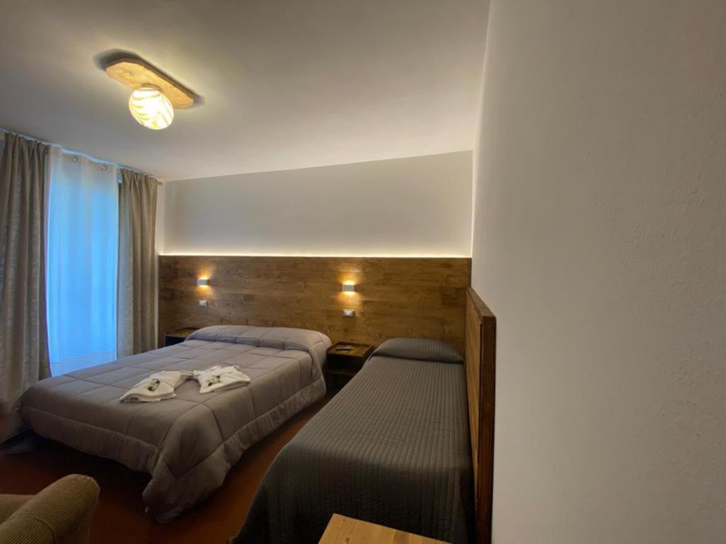 Albergo Quai Monno Buitenkant foto