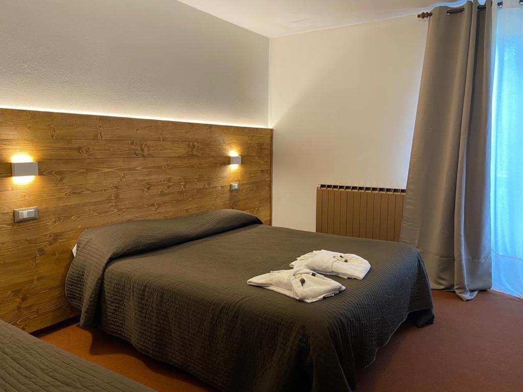 Albergo Quai Monno Buitenkant foto